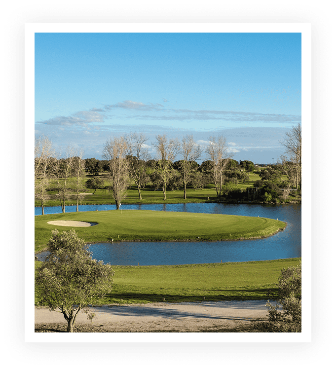 Scenic golf course with trees and water features