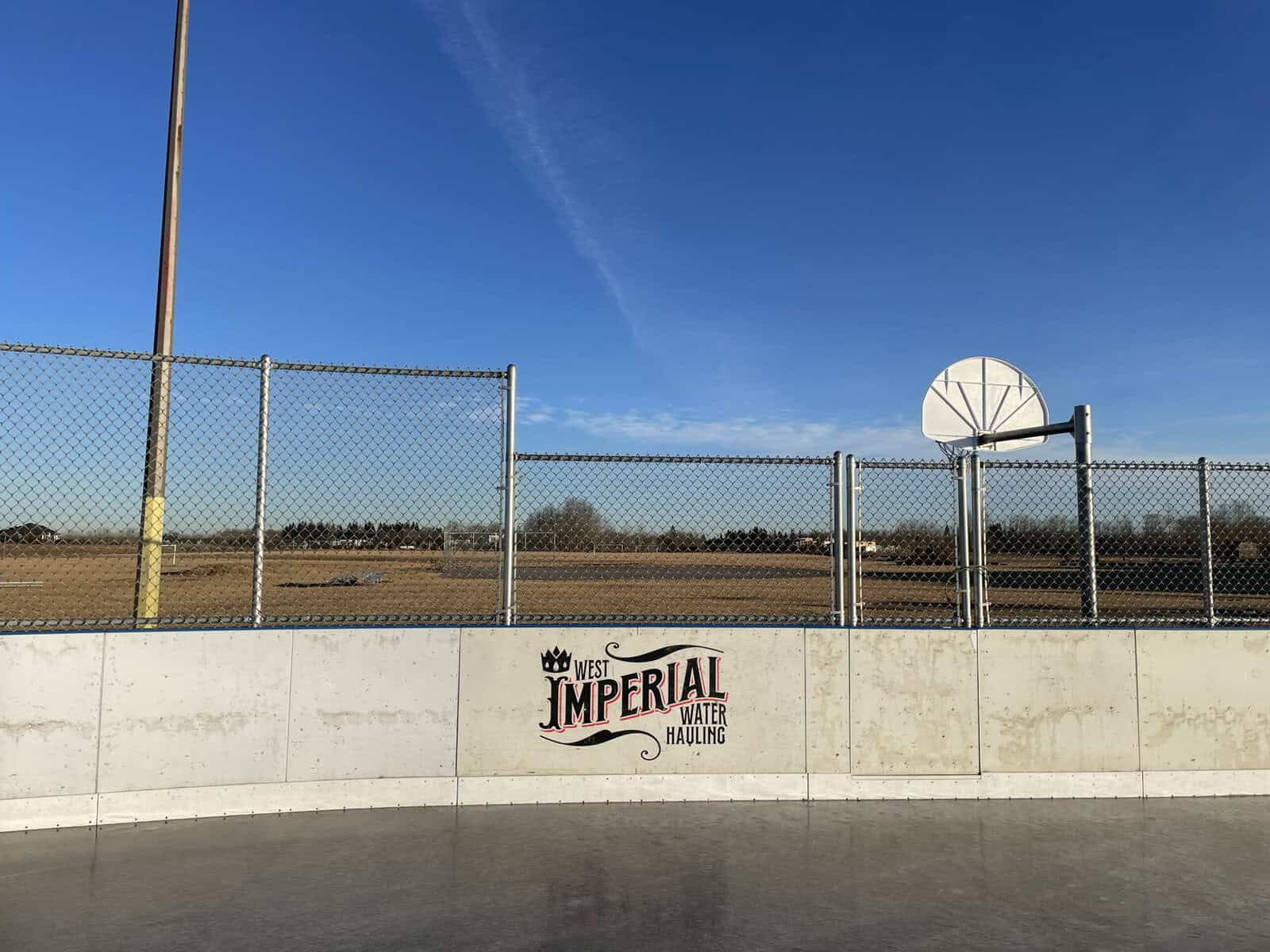 Outdoor skating rink with clear blue sky